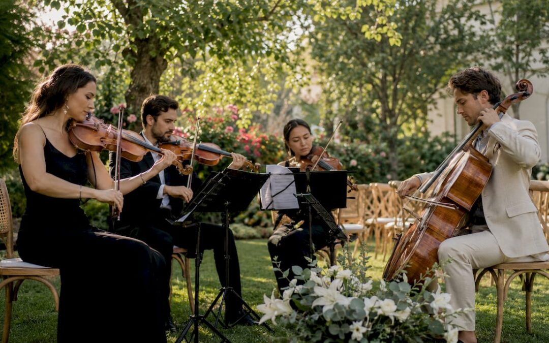 String quartet performing at elegant wedding ceremony