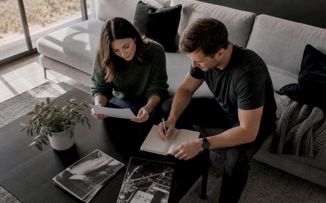 Couple planning wedding music brief at home