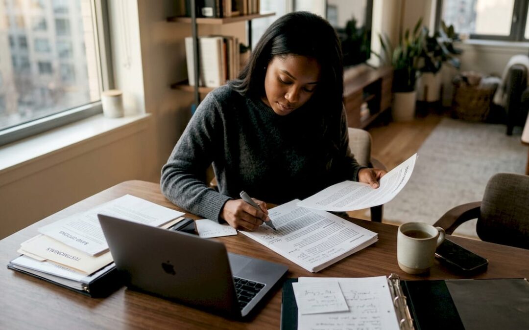 Woman reading band testimonials at table