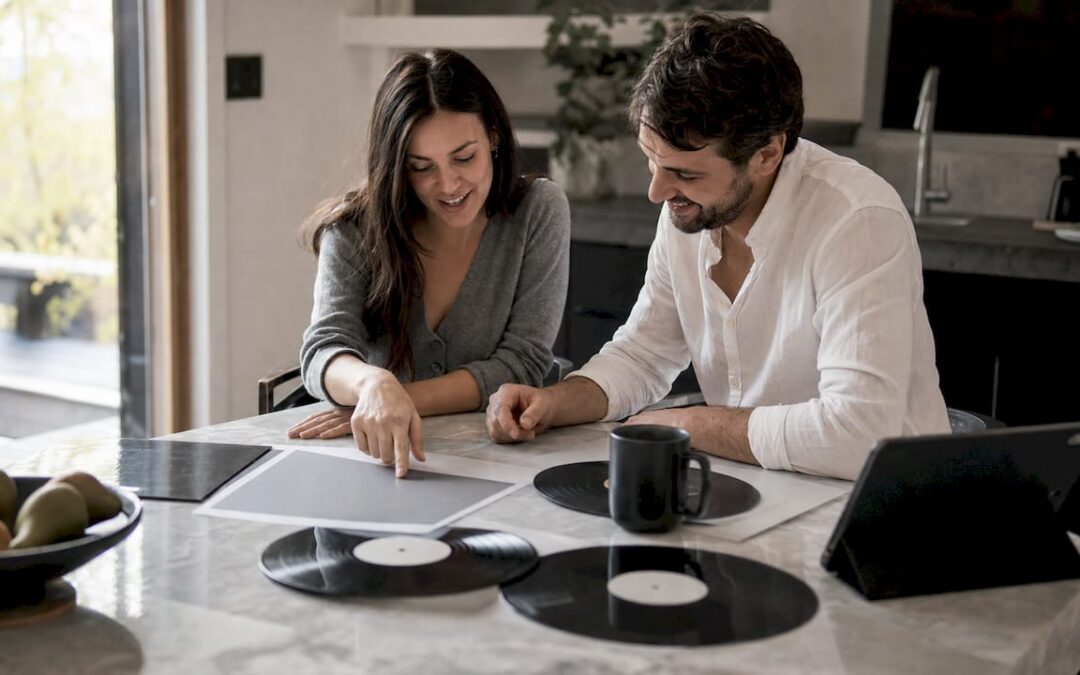 Couple briefing wedding band with music materials