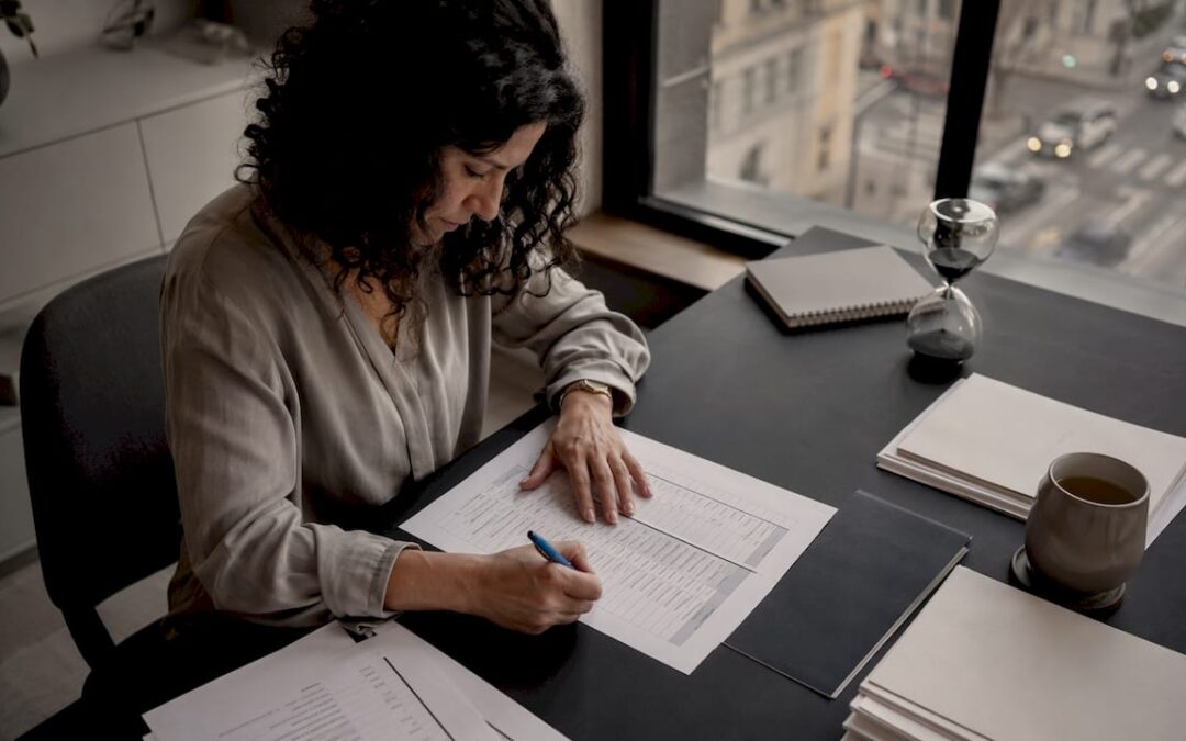 Wedding planner reviewing ceremony music timeline