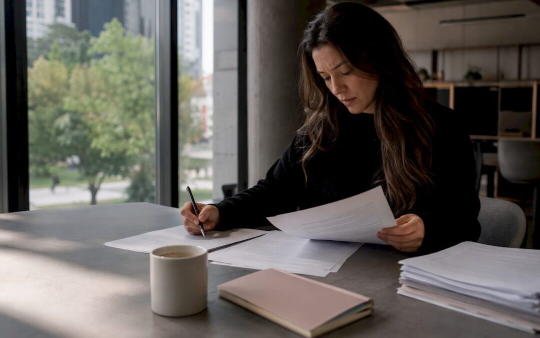Event planner reviewing function band contracts