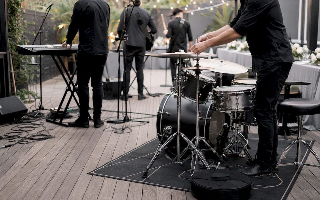 Wedding band setting up instruments