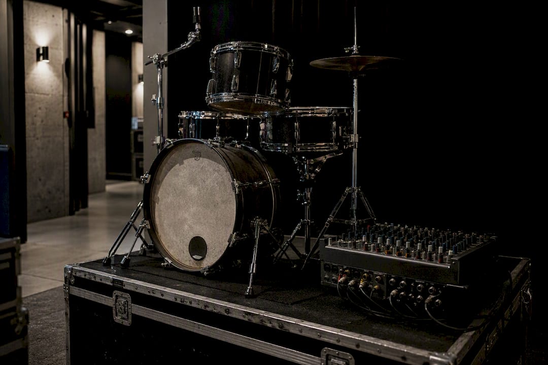 Backup microphone and DI box on road case