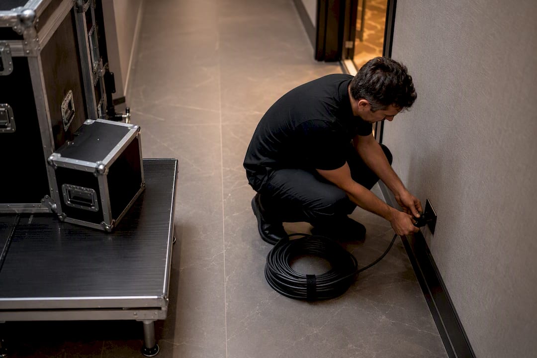 Technician checking wedding venue power access